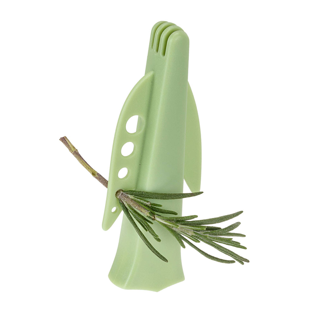 Green protective sheath of the Joie Tulip Herb Scissors being used as an herb stripper, pulling fresh rosemary leaves from a woody stem.