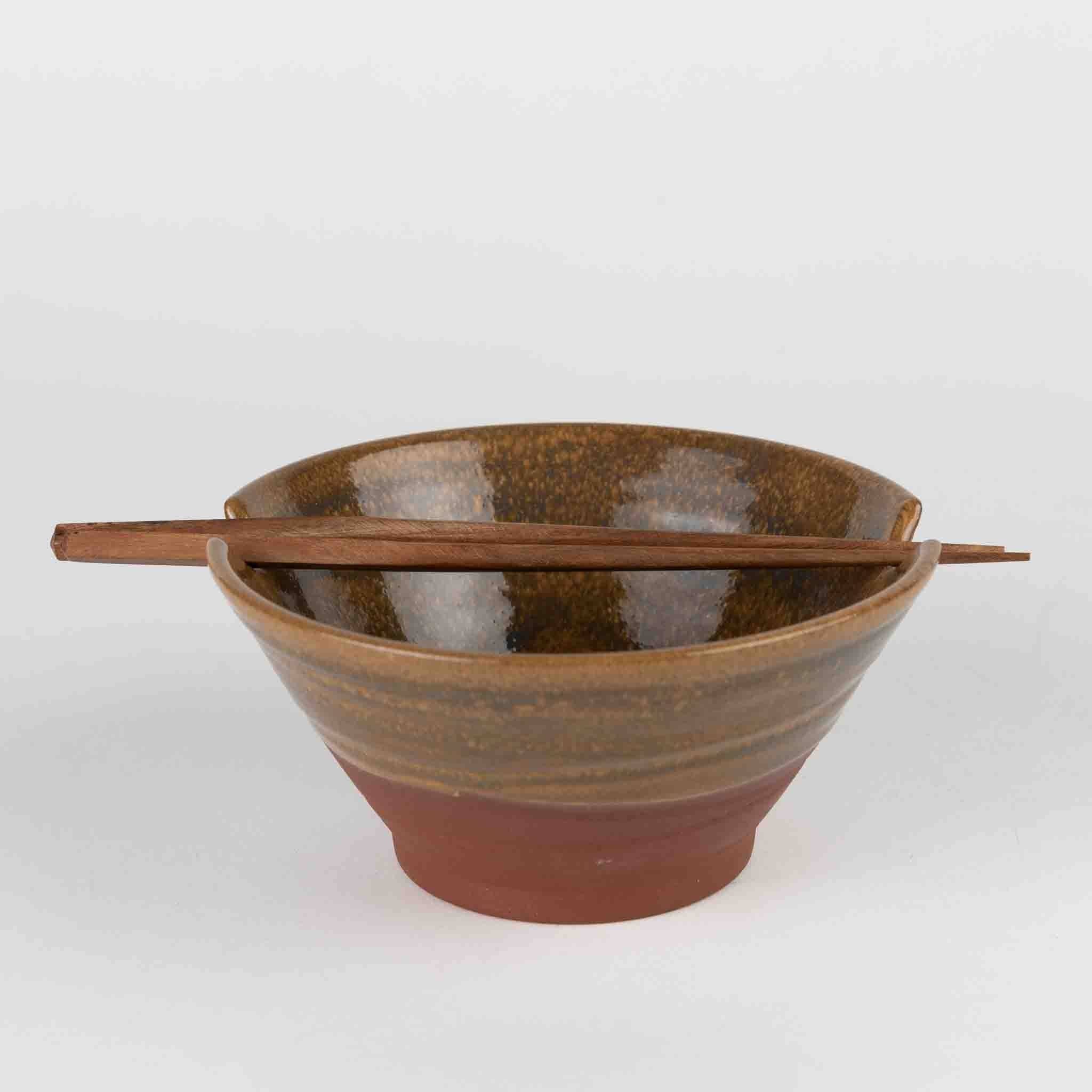Front-facing bowl with chopsticks (gray bg): "Front view of two-tone terracotta and amber glazed ceramic ramen bowl with Saj wood chopsticks, part of the Terra Cotta Harvest collection"