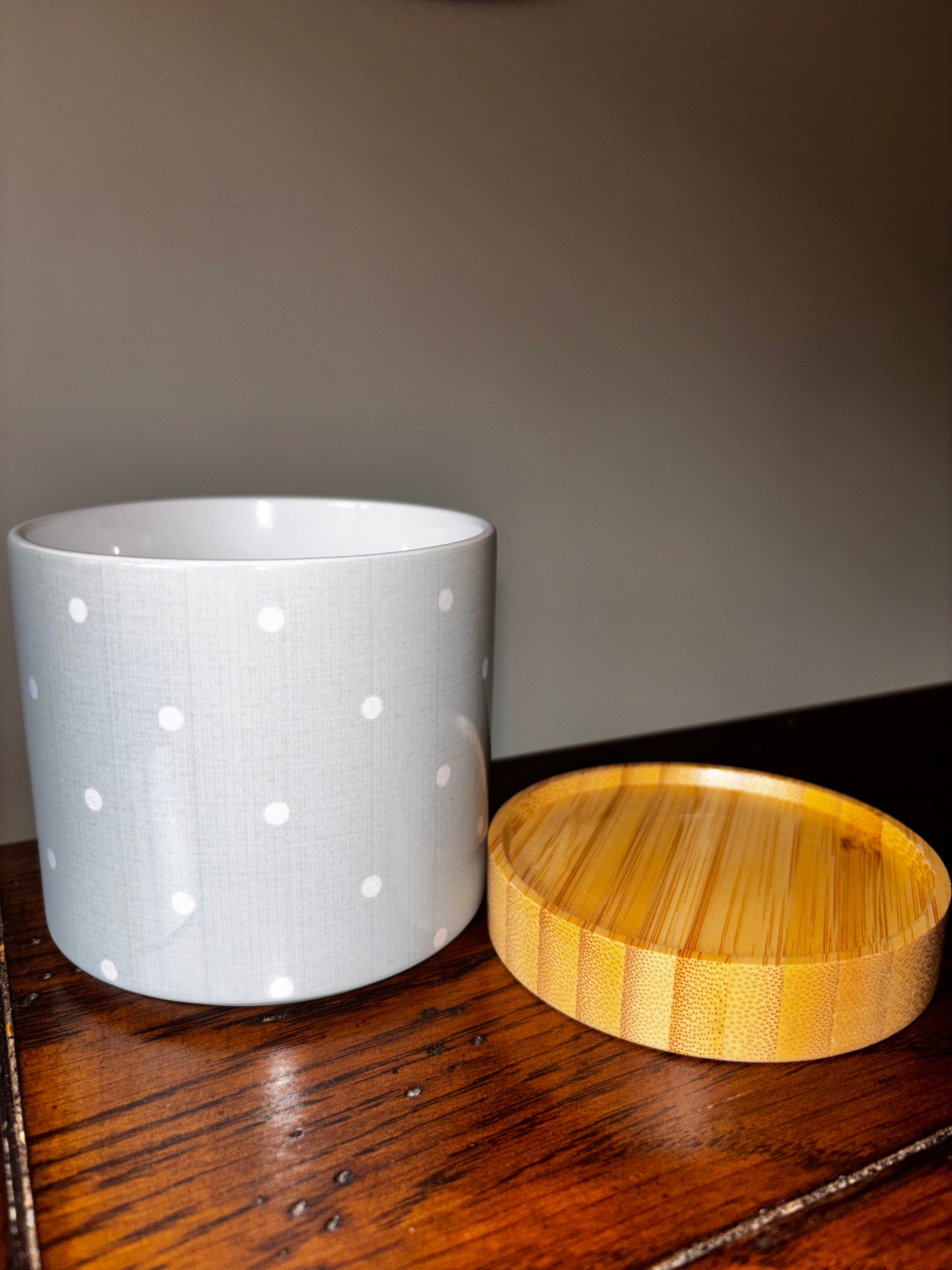Light grey ceramic white polka dot planterl print shown with bamboo tray removed beside it