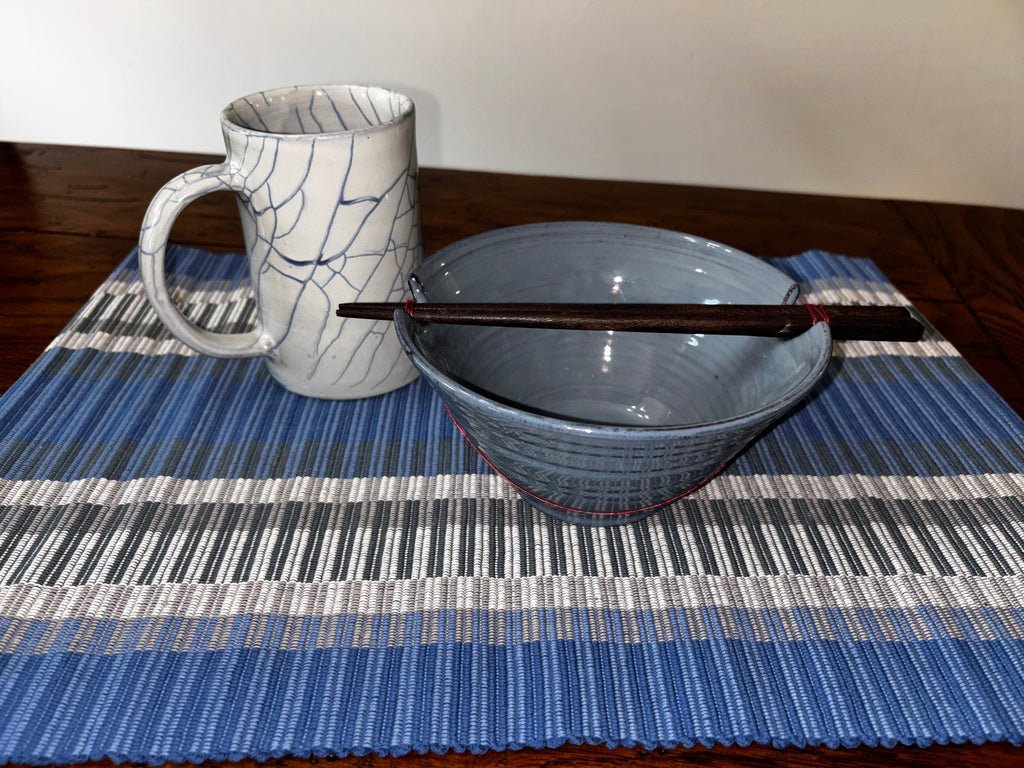 Indigo Night Ramen Set — blue crackle mug, blue stoneware bowl with chopsticks, and blue striped handloomed placemat, handcrafted in Nepal by Ten Thousand Villages