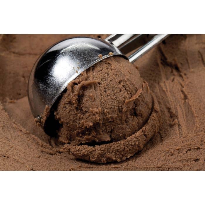 Close-up of the Mrs. Anderson's Baking No. 40 stainless steel scoop pressing into a container of chocolate ice cream, forming a perfectly round scoop.