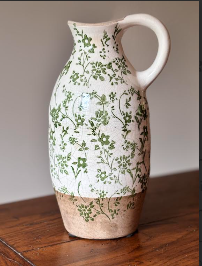 Tall cottage garden ceramic pitcher vase with delicate green botanical floral print on soft cream glaze, subtle crackle finish, and natural unglazed clay base — The Everyday Shoppe"